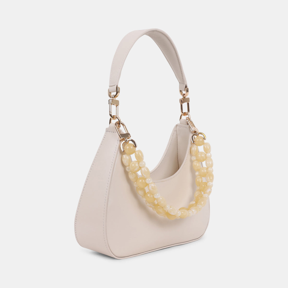 Dolce Vita Solen women's cream mini bag, side view