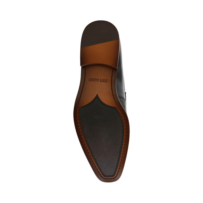Steve Madden Pontor men's black slip-on dress shoes, angled view